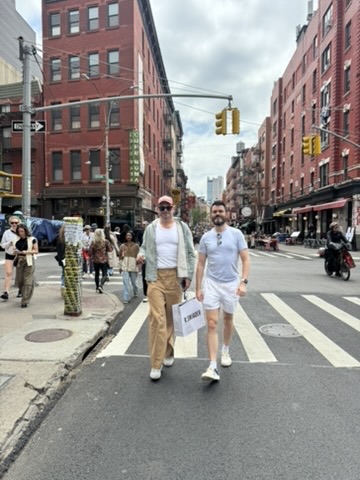 Micheal Sheehy walking through New York City with his American husband